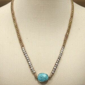 TURQUOISE PENDANT WITH GREY AND WHITE ACCENT BEADS.